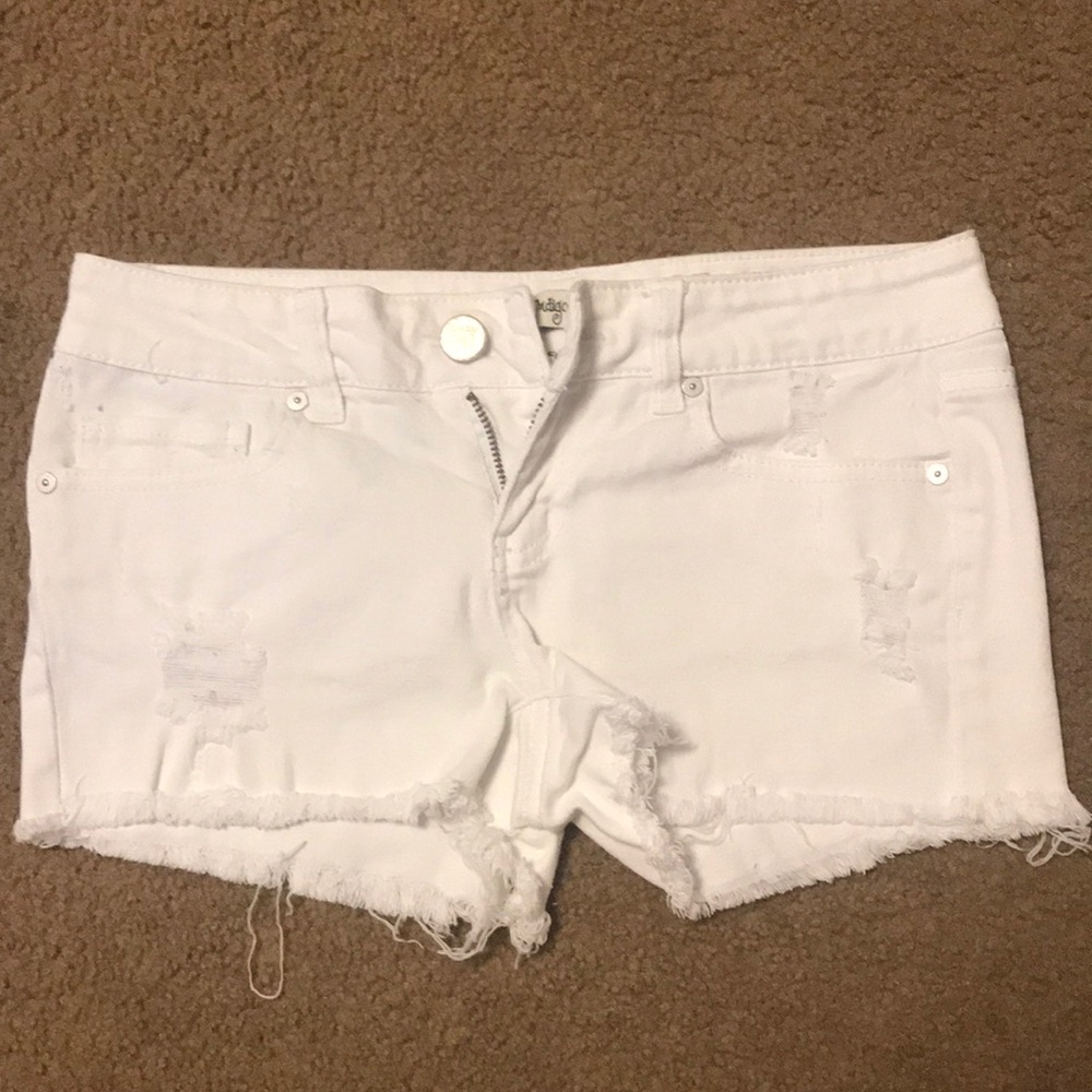 White distressed shorts